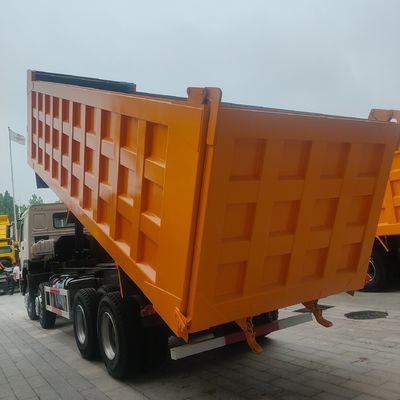 Στυλ ανύψωσης εμπρός Sinotruk Chassis Heavy Duty Dump Truck με υδραυλικό βοηθητικό τιμόνι